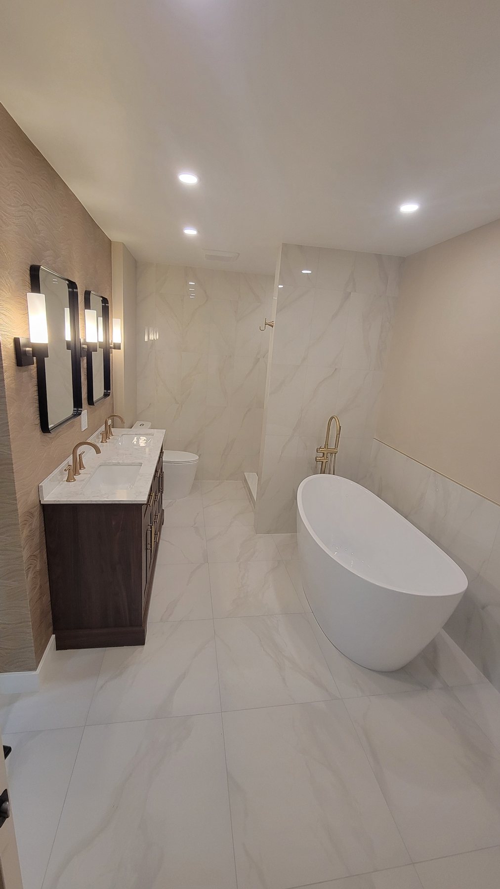 Bathroom finish work by MK Building Innovations