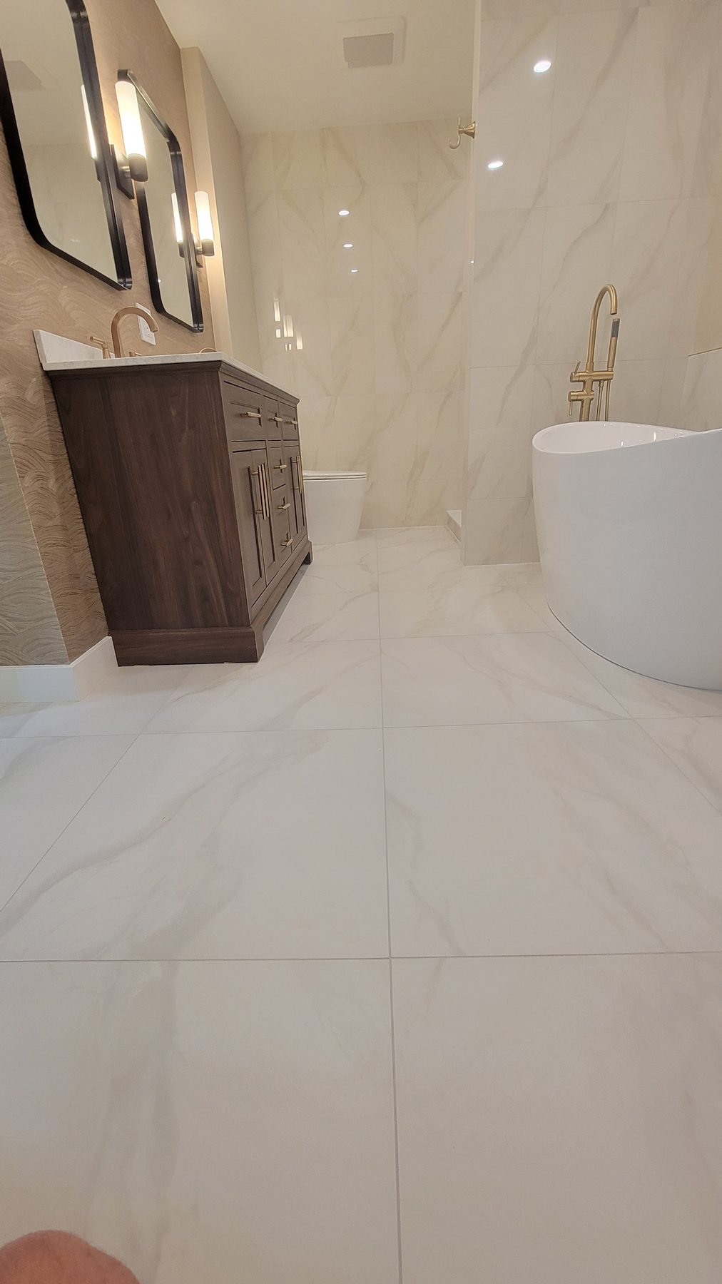 Bathroom finish work by MK Building Innovations